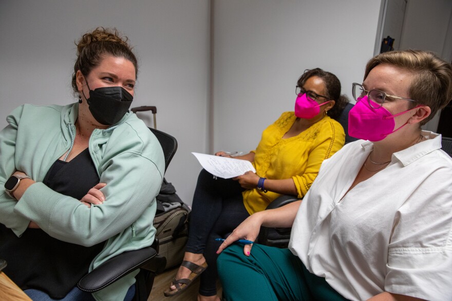 Partners in Abortion Care co-owners Dr. Diane Horvath (l) and Morgan Nuzzo (r) meet with chief operating officer Kim Lee-Wilkins in their clinic in College Park, Md.